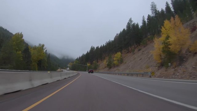 Early fall morning drive through the Bitterroot Mountains in Montana