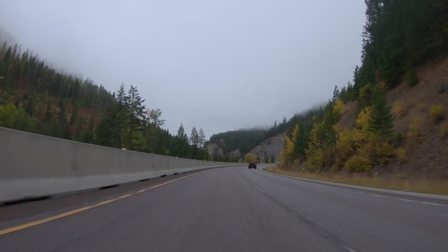 Early fall morning drive through the Bitterroot Mountains in Montana