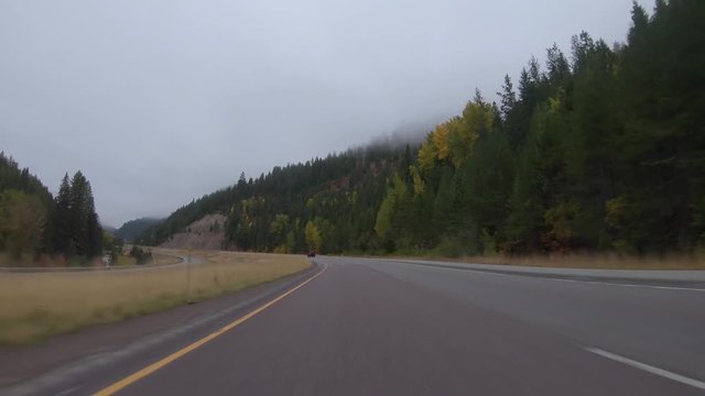 Early fall morning drive through the Bitterroot Mountains in Montana