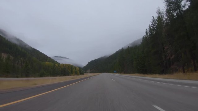 Early fall morning drive through the Bitterroot Mountains in Montana