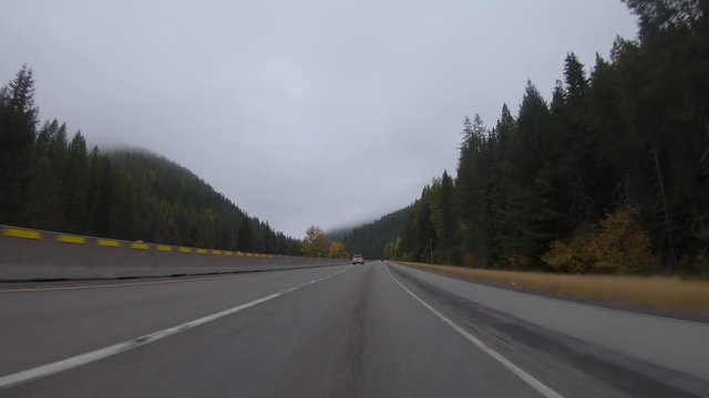 Early fall morning drive through the Bitterroot Mountains in Montana