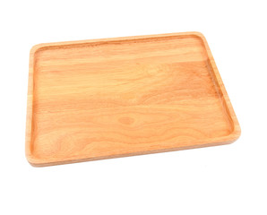 Brown wooden cutting board on white background