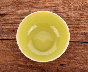 Empty bowl on wood