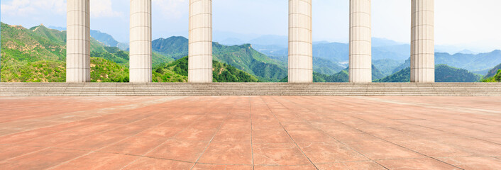 Empty square floor and modern architecture with mountain natural scenery