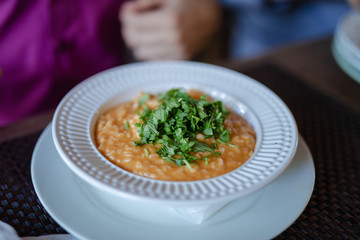 Red rice, risotto with tomatoes