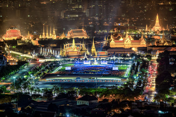 Fototapeta na wymiar Fireworks on Father's day while King Bhumibol's body was living in as passed away Grand Palace Emerald Buddha city view skyline at night, Bangkok, Thailand.