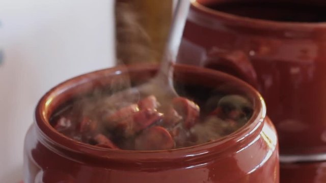 feijoada served in a ceramic pot