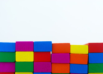 Arrangement of colorful wooden block on white background