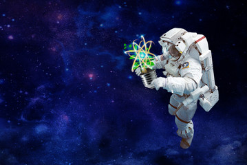 cosmonaut witch plants gardening on clean space energy.elements of this image furnished by NASA
