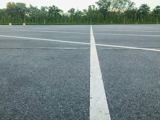 Obraz premium empty outdoor car parking lot at evening