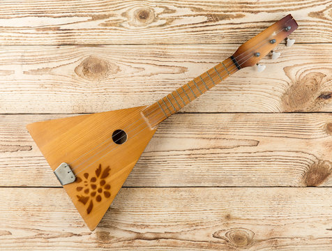place settings of balalaika, a traditional Russian instrument