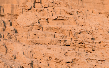 Wall of sand at sunset for background