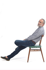 portrait of middle aged lying on a chair