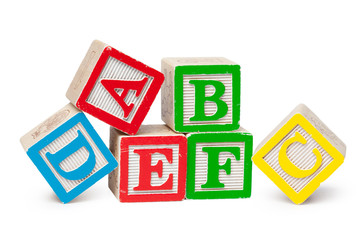 Wooden alphabet blocks isolated on white background