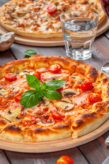 Delicious fresh pizza served on wooden table