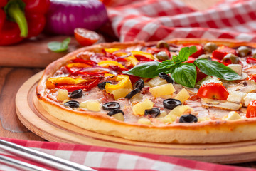 Delicious fresh pizza served on wooden table