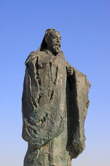 Figure sculpture in the blue sky in a park
