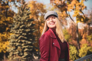 Fototapeta na wymiar Happy smiling beautiful plus size model . Close up large girl smiling on a sunny day with good mood, Photo of new age standard of beauty, autumn time 