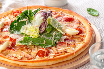 Delicious fresh pizza served on wooden table