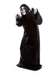 The grim reaper or death halloween costume isolated on a white background.  The skeleton is wearing...