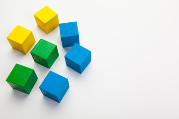 Obraz premium Colorful wooden building blocks isolated on white background