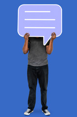 Man showing blank speech bubble symbol