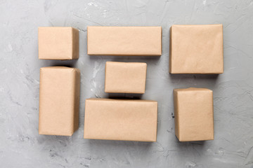 top view of various gift boxes, blank for you design on gray cement desk