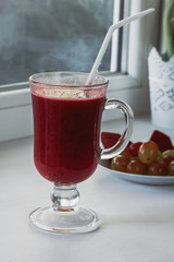 Beet juice, stands on the window. Concept - cleansing the body of toxins