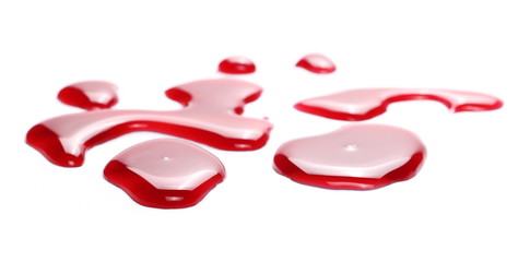 Red wine puddle, droplets isolated on white background