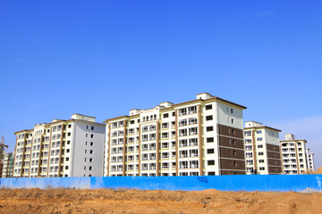 unfinished building under the blue sky