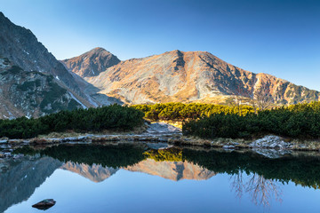 Fototapeta premium Mountain landscape with tarn at autumn, The area of Rohace in Tatras National Park, Slovakia, Europe.
