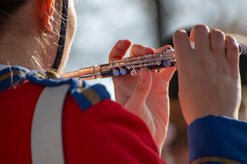 A pipe musician  playing at Jardin du Luxembourg, Paris, France © Dom