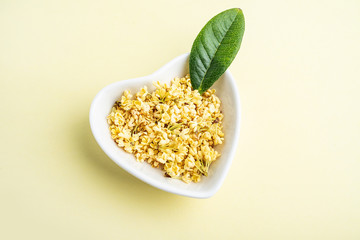 Fresh osmanthus on pink background