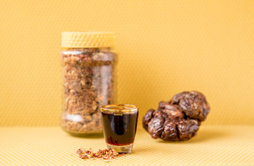Propolis or bee glue is a resinous mixture that honey bees produce by mixing saliva and beeswax...