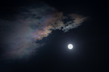Moon and rainbow cloud