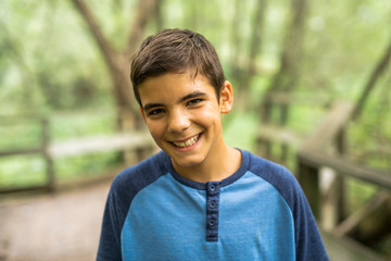 Portrait of a boy outdoors in the forest