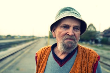 old man on old job train railway 