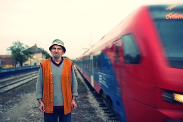 old man on old job train railway 
