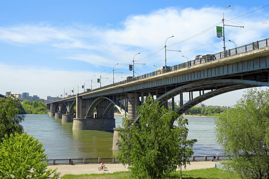 Automobile bridge over the Ob river on a summer day in Novosibirsk