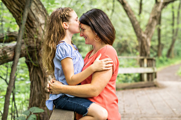 Fototapeta premium mother and her daughter on summer forest
