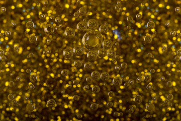 texture of bubbles on a golden shiny background