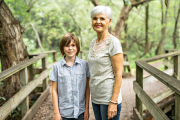 Grandmother and grandson spend the weekend in the park