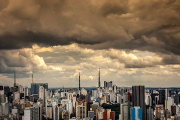 dramatic storm clouds over Sao Paulo skyline