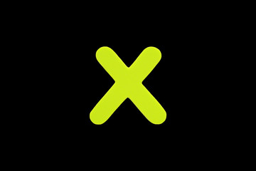 Alphabet letter X symbol of sponge rubber isolated over black background.