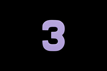 Fototapeta premium Arabic number 3 symbol of sponge rubber isolated on black background.