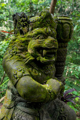 Fototapeta na wymiar Balinese statue on a temple in Monkey Forest