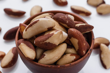 brazil nut on a white acrylic background