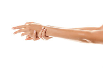closeup of female hands applying hand cream on white background - obrazy, fototapety, plakaty