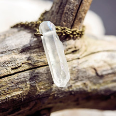 Natural crystal quartz pendant on metal chain