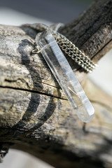 Natural crystal quartz pendant on metal chain